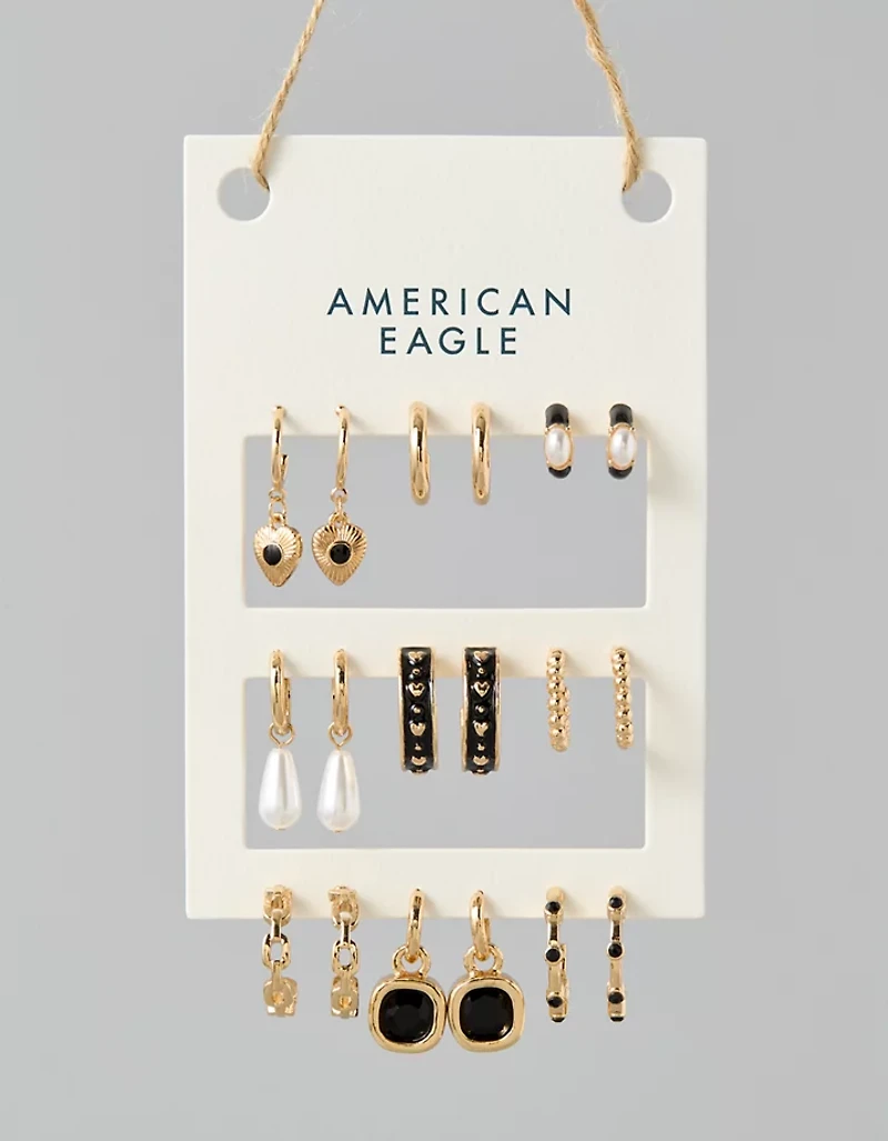 Lot de neuf paires de boucles d’oreille dorées et noires AEO