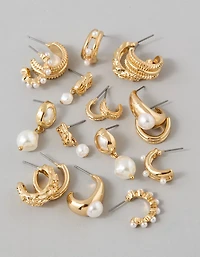 Lot de neuf paires de boucles d’oreille dorées et à perles AE