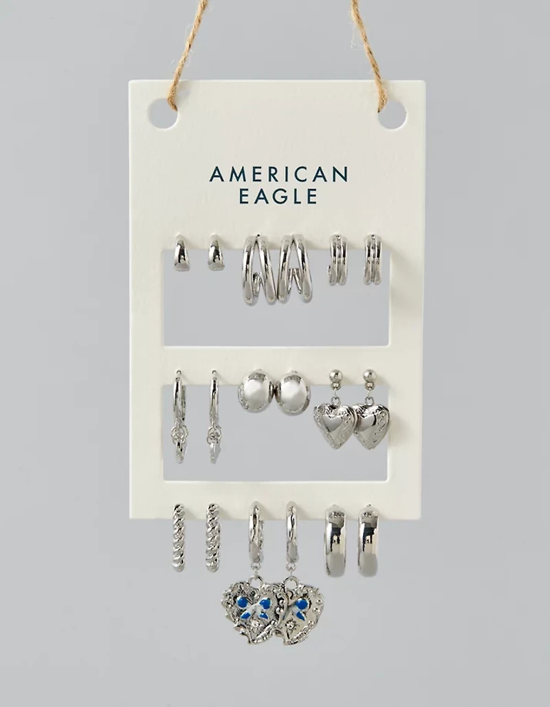 Emballage de neuf paires de boucles d’oreille avec boucles argentées AE