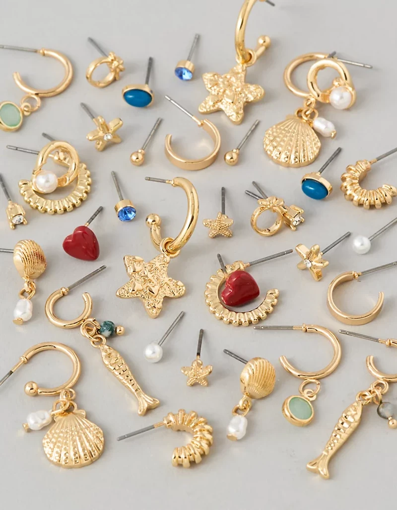 Ensemble de deux paires de clous d’oreille et initiale L AEO