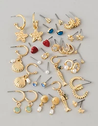 Ensemble de deux paires de clous d’oreille et initiale L AEO