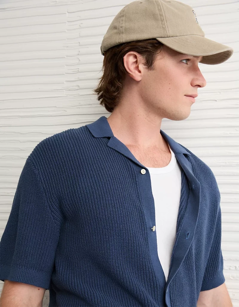 Polo boutonné à mailles perlées en tricot de chandail AE