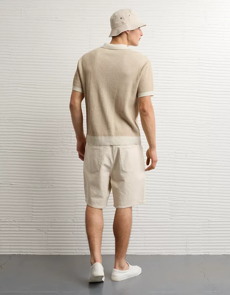 Polo en tricot boutonné et rayé AE