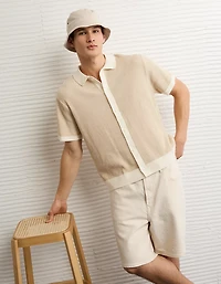 Polo en tricot boutonné et rayé AE