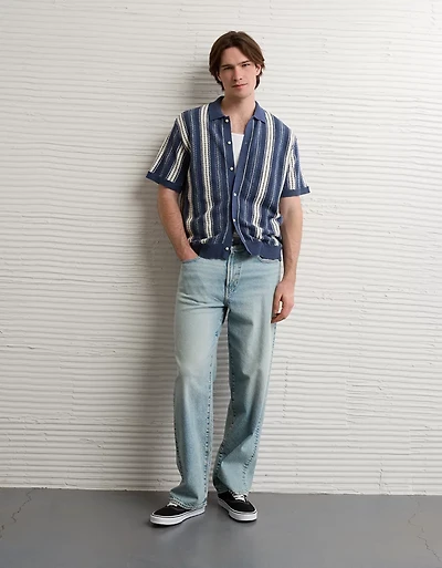 Polo en tricot boutonné et rayé AE