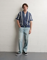 Polo en tricot boutonné et rayé AE