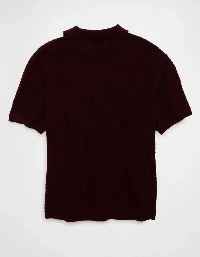 Polo en tricot boutonné et rayé AE