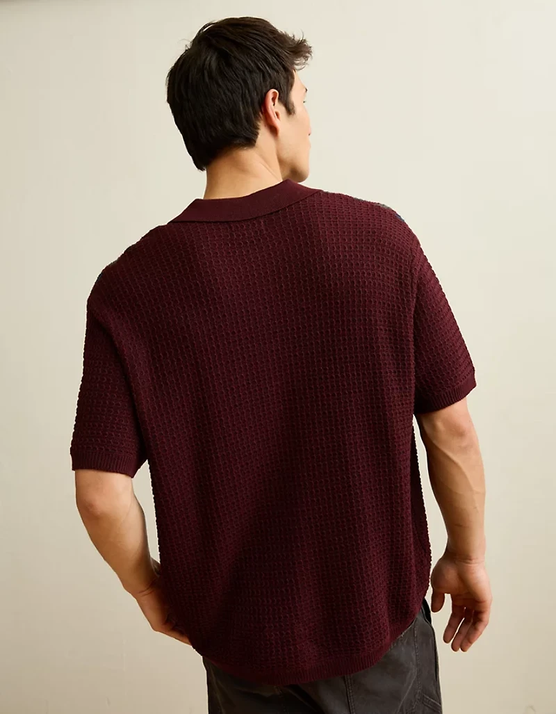 Polo en tricot boutonné et rayé AE