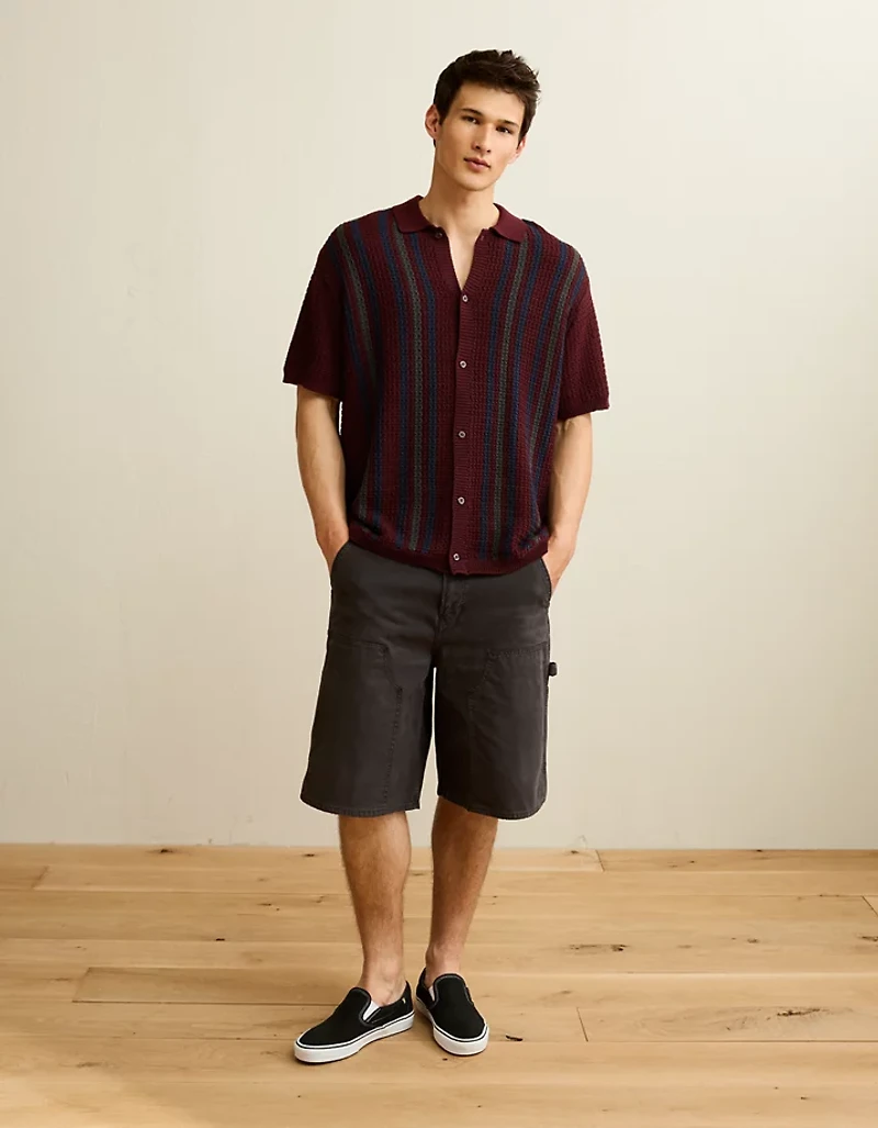 Polo en tricot boutonné et rayé AE