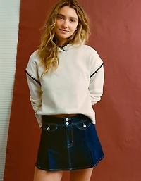 Minijupe trapèze plissée en denim extensible à taille basse AE