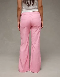 Pantalon évasé à taille très basse extensible AE