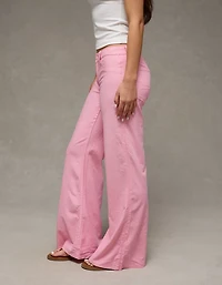 Pantalon évasé à taille très basse extensible AE