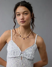 Robe à bretelles mi-longue avec encolure en V et volants AE