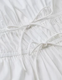 Minirobe dos nu à encolure en V attachée l’avant AE