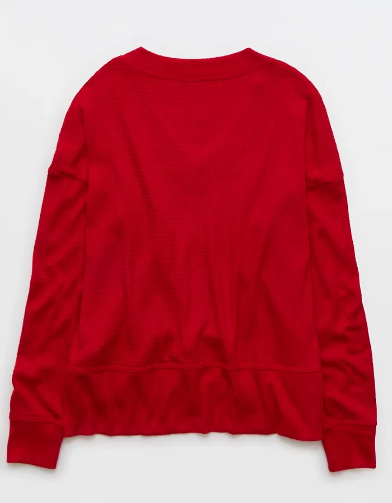 Haut pelucheux à encolure en V et manches longues AE