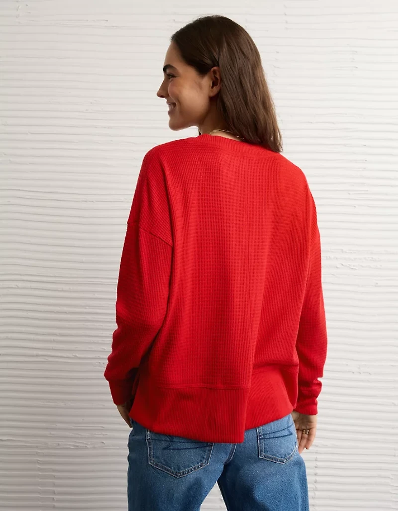 Haut pelucheux à encolure en V et manches longues AE