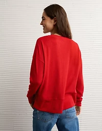 Haut pelucheux à encolure en V et manches longues AE