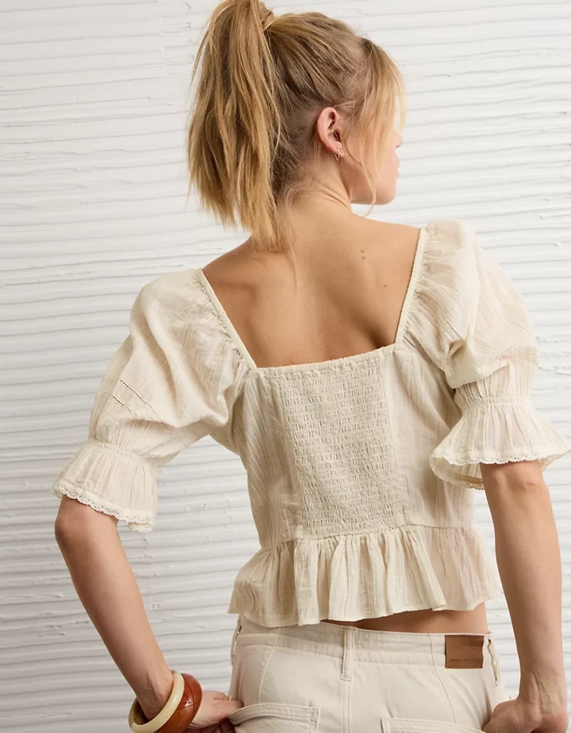 Blouse à nervures et manches bouffantes AE