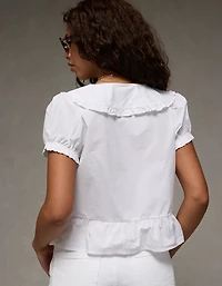 Blouse nouée à l’avant manches bouffantes et col AE