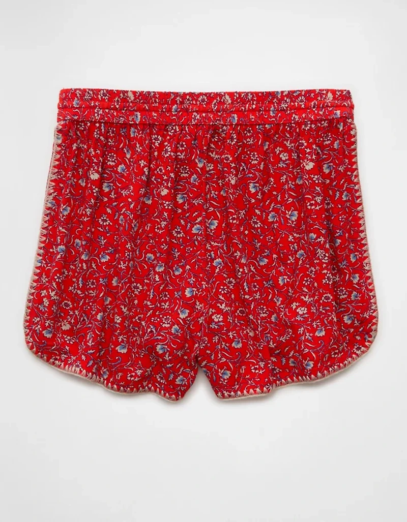 Short à ourlet dauphin taille haute motif floral AE