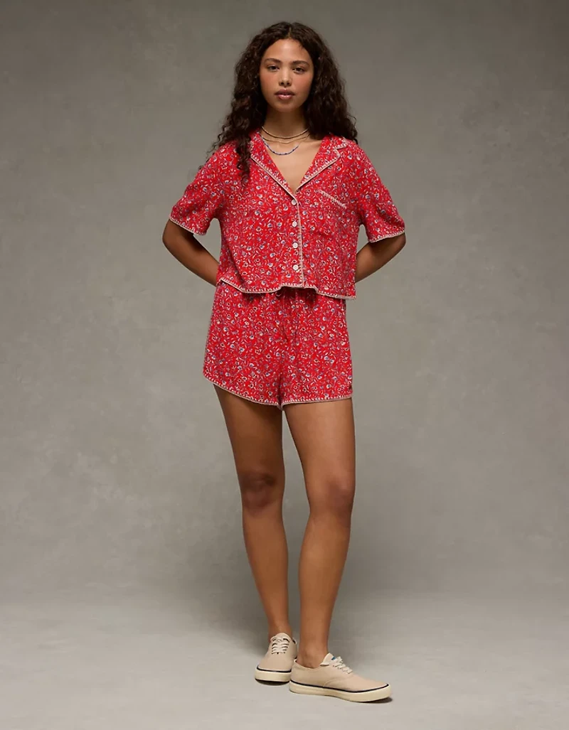 Short à ourlet dauphin taille haute motif floral AE