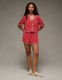 Short à ourlet dauphin taille haute motif floral AE