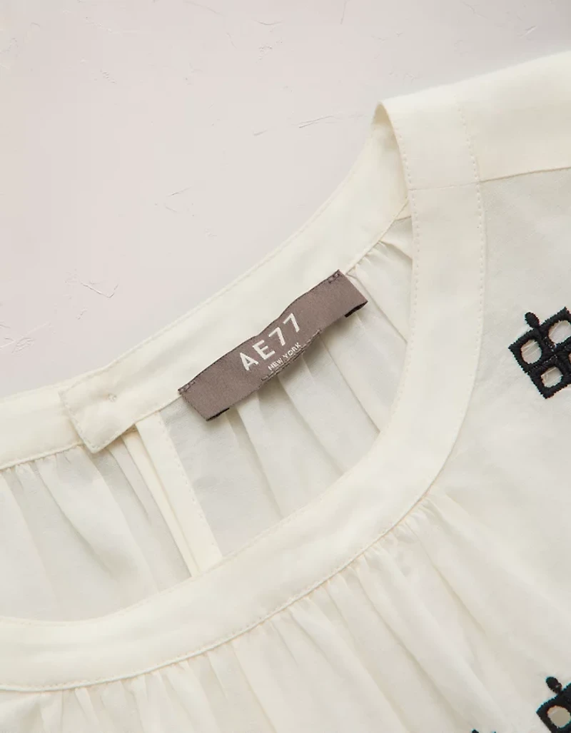 AE77 Embroidered Bell Sleeve Blouse