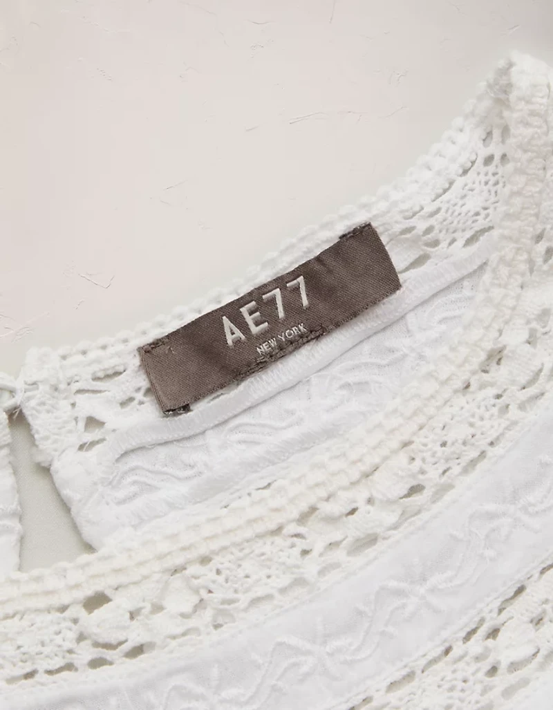 AE77 High Neck Embroidered Top