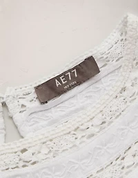 AE77 High Neck Embroidered Top