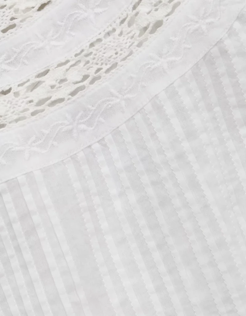 AE77 High Neck Embroidered Top