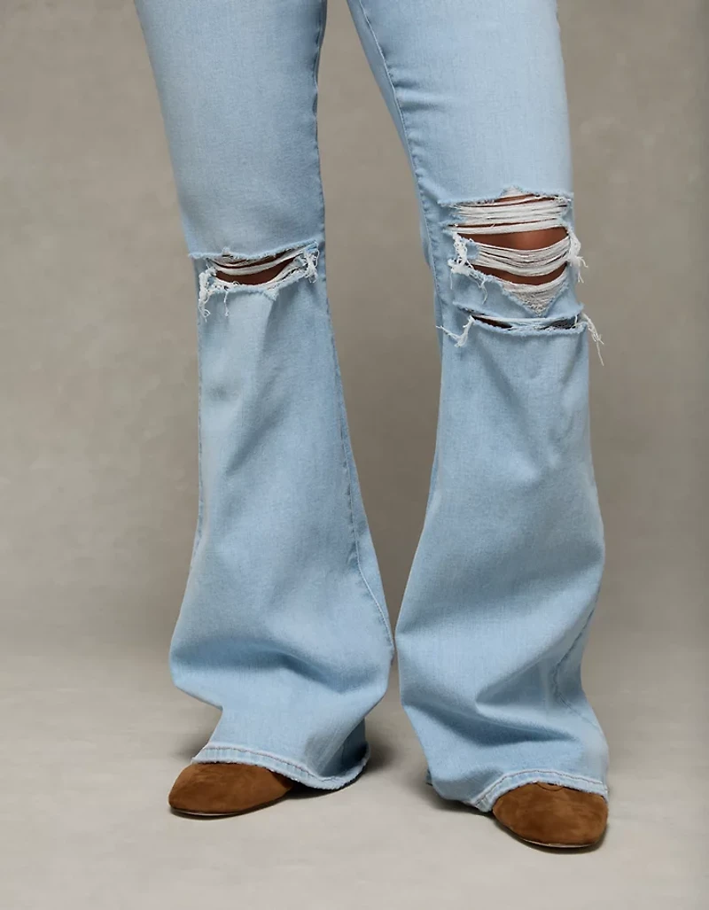 Jean à jambe évasée taille très haute déchiré en rondeur Next Level AE