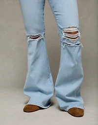 Jean à jambe évasée taille très haute déchiré en rondeur Next Level AE