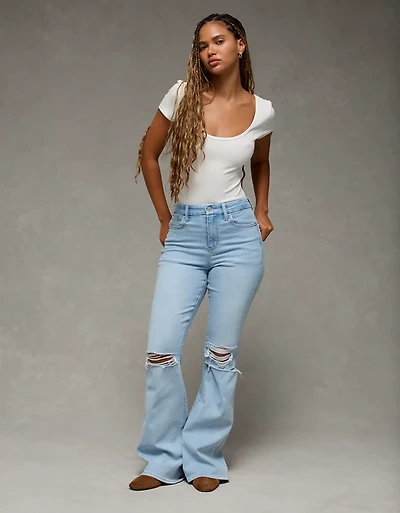 Jean à jambe évasée taille très haute déchiré en rondeur Next Level AE