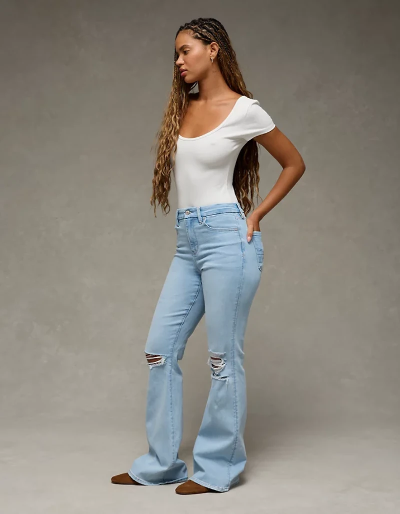 Jean à jambe évasée taille très haute déchiré en rondeur Next Level AE