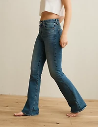 Jean à jambe évasée taille très haute en rondeur AE