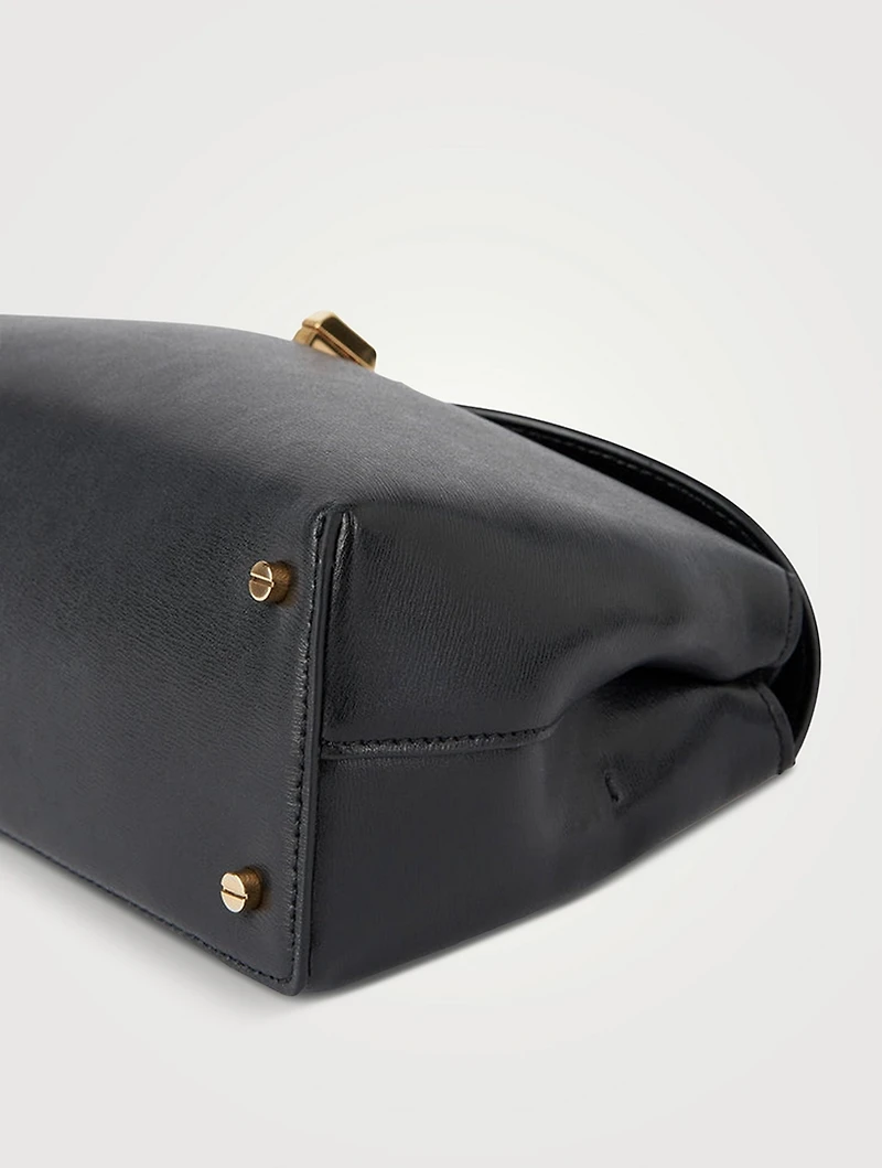 T-Lock Leather Clutch