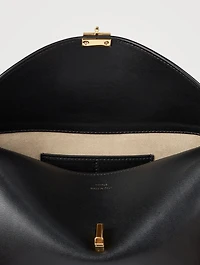 T-Lock Leather Clutch