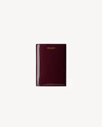 SAINT LAURENT PARIS passport case in patent leather