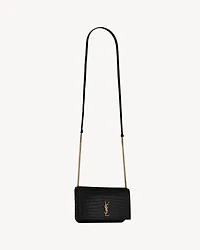 CASSANDRE phone holder in SHINY crocodile-embossed leather