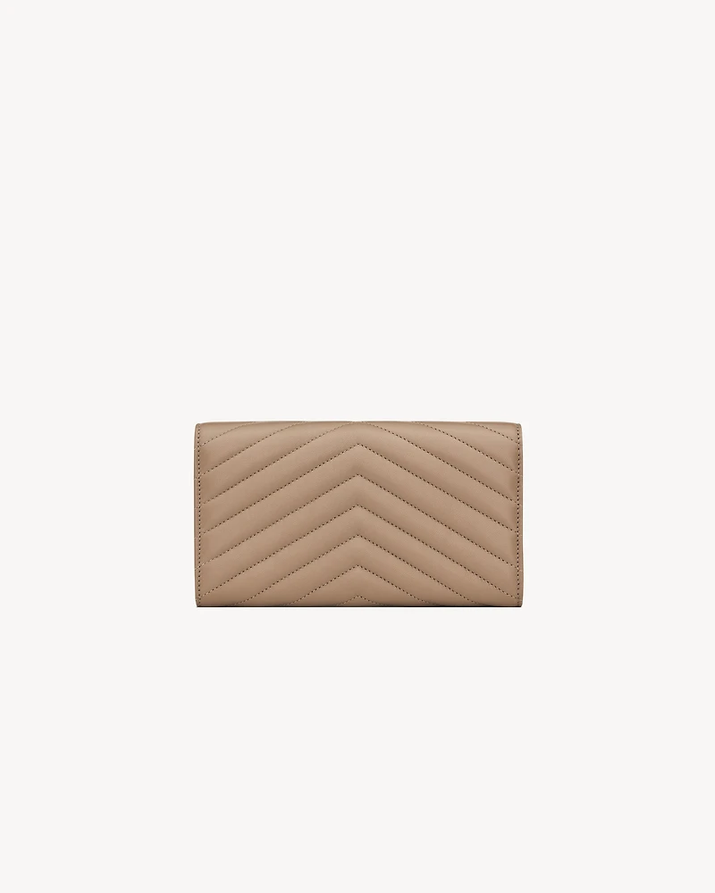 CASSANDRE MATELASSÉ large flap wallet in lambskin