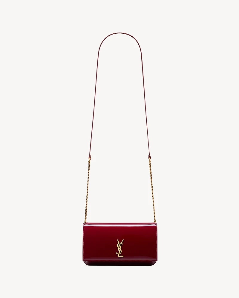 CASSANDRE phone holder in patent leather