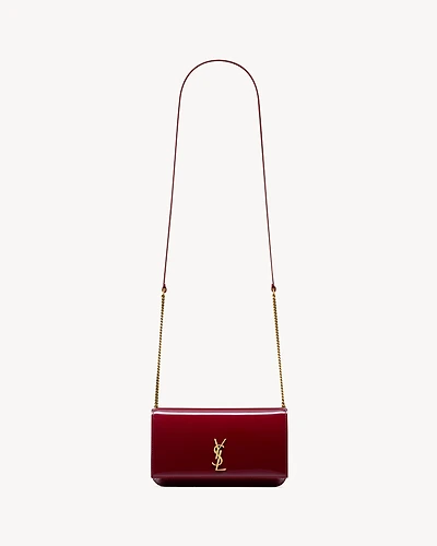 CASSANDRE phone holder in patent leather
