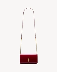 CASSANDRE phone holder in patent leather