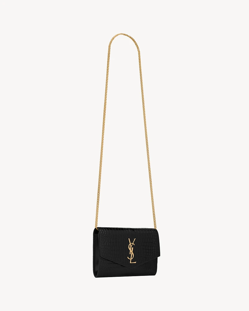 Uptown chain wallet in shiny crocodile-embossed leather