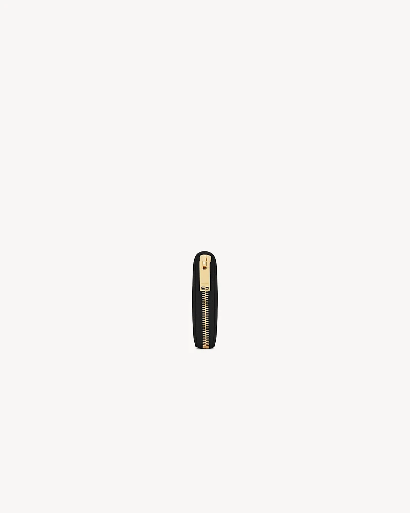 CASSANDRE MATELASSÉ ZIP AROUND WALLET IN GRAIN DE POUDRE LEATHER