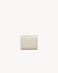 CASSANDRE MATELASSÉ MULTI-FOLDED WALLET IN GRAIN DE POUDRE LEATHER