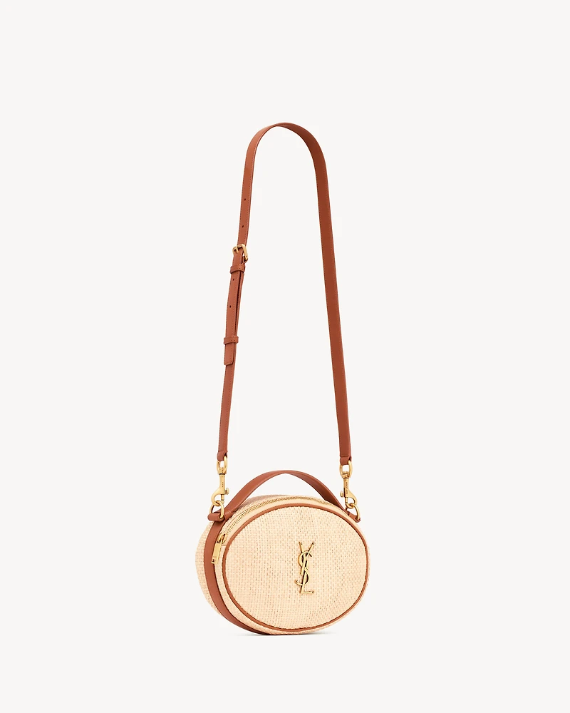 Camera bag in raffia and vegetable-tanned leather