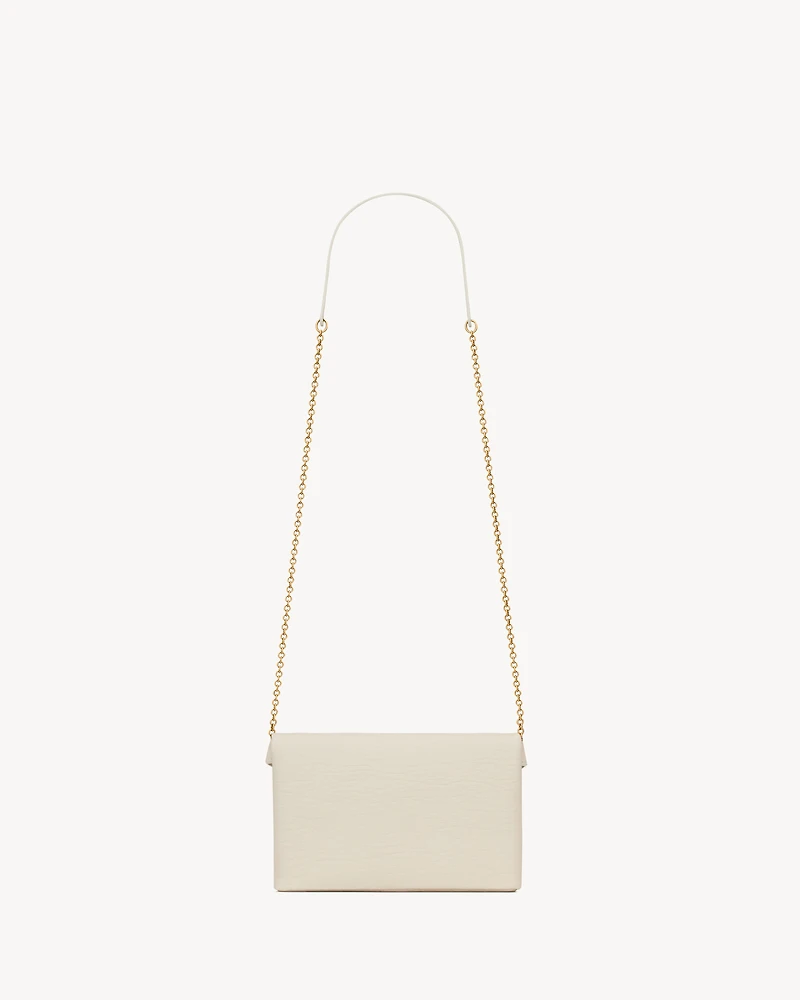 CASSANDRE chain clutch in lambskin