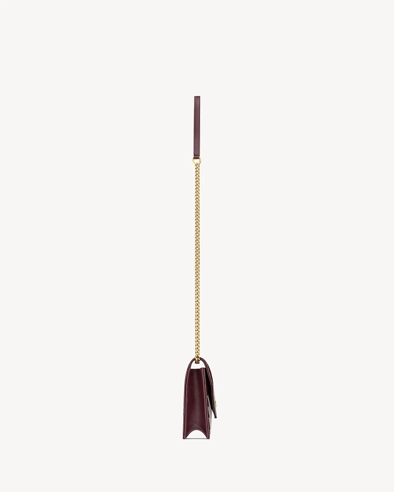 CASSANDRE envelope chain wallet in patent leather