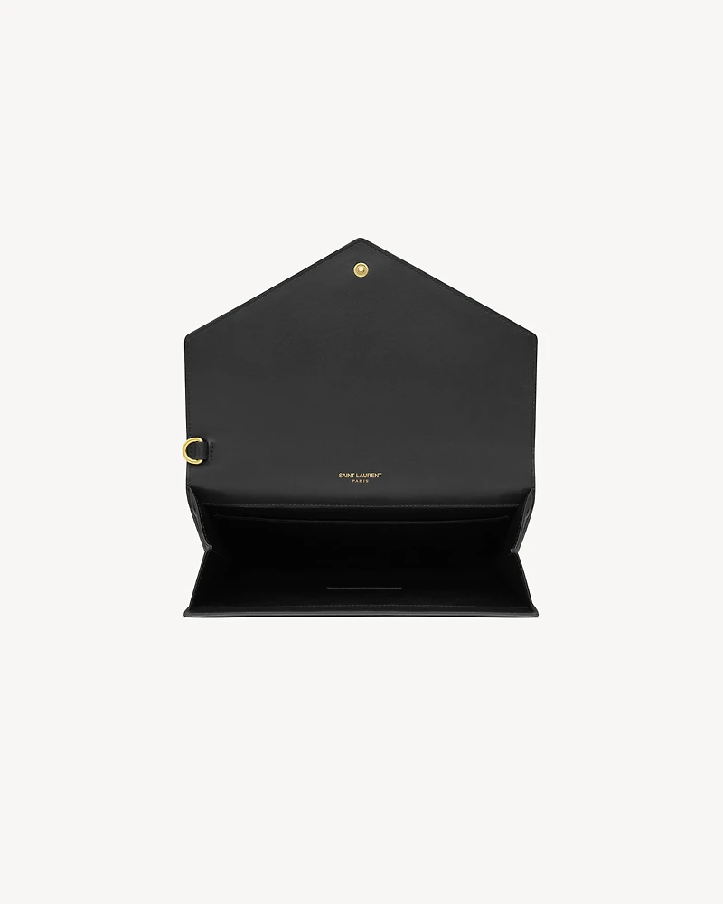 CASSANDRE flap pouch in crocodile-embossed shiny leather